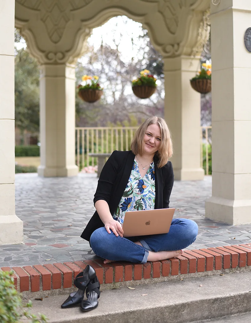 Genia Bowyer working on a nonprofit website
